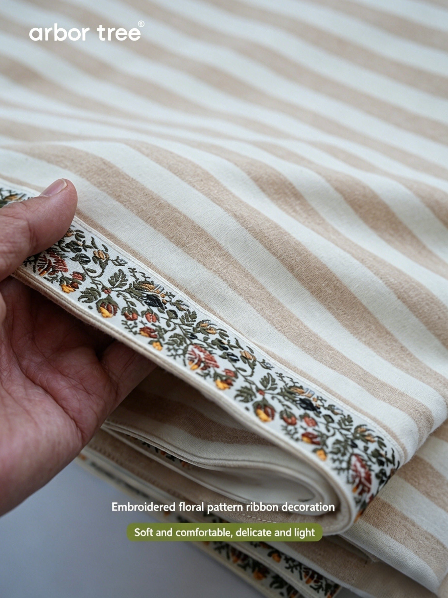 ArborTree organic cotton baby blanket with three-layer terry cloth, warm, soft, and moisture-wicking for gentle skin comfort.