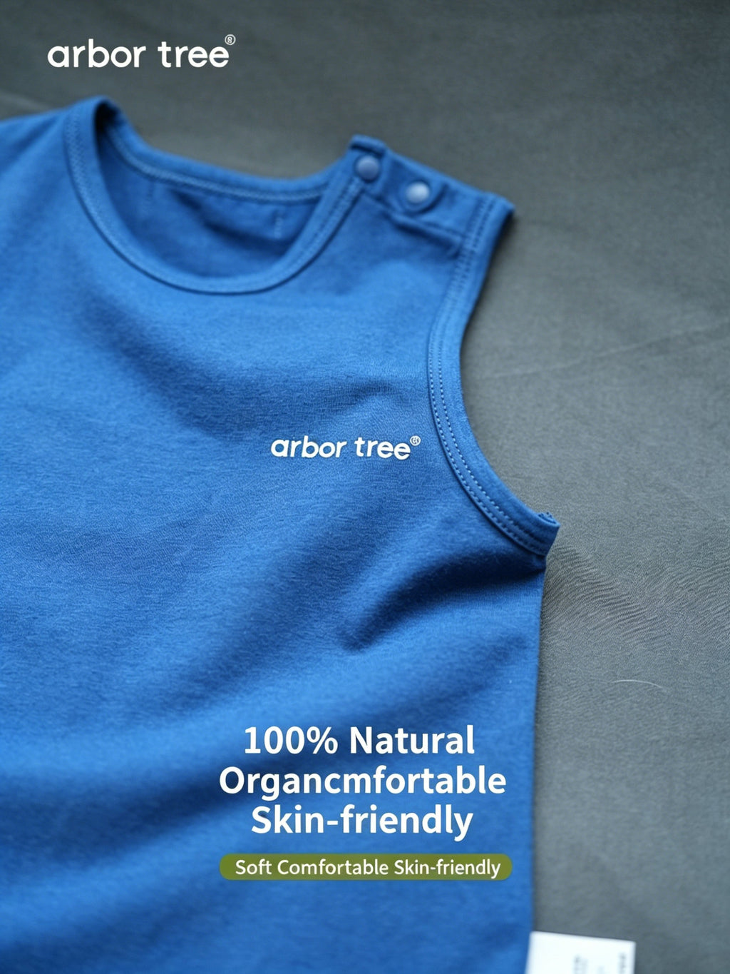 ArborTree organic cotton unisex baby romper with sleeveless open-shoulder design and triangular pattern, perfect for summer wear.
