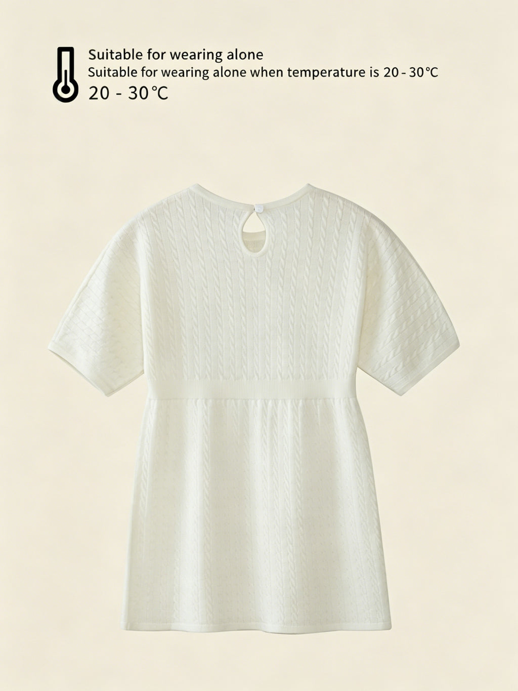 ArborTree 100% Merino superfine wool baby dress in soft cream, featuring gentle ruffles and long sleeves for cozy infant wear.