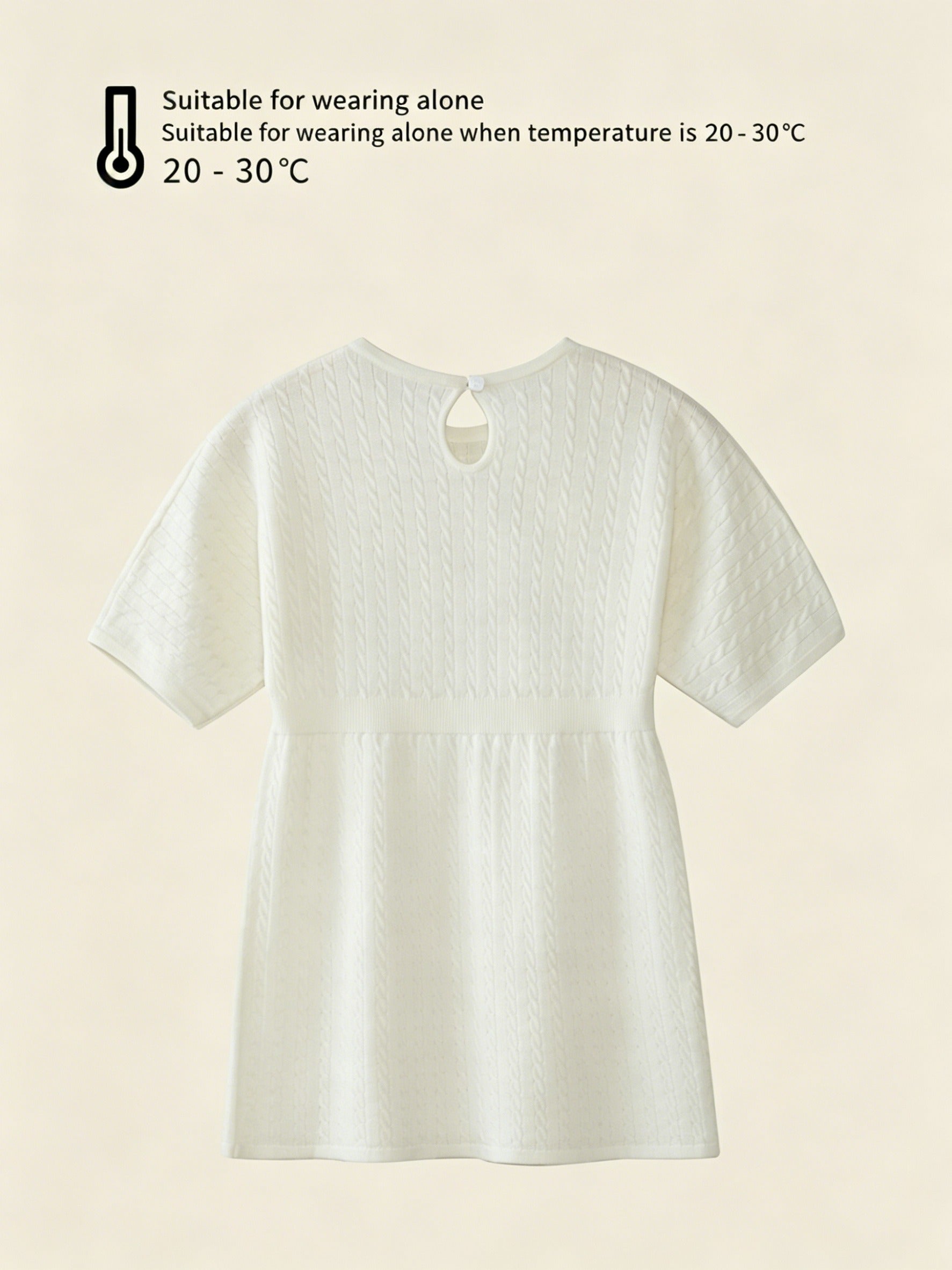 ArborTree 100% Merino superfine wool baby dress in soft cream, featuring gentle ruffles and long sleeves for cozy infant wear.